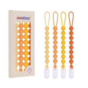 lot 2289 image: 4 Pcs Yellow Baby Silicone Teething Pacifier Clip,One-piece Design,Round Shape,Smooth Surface,BPA Free.