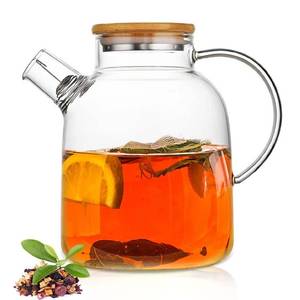 lot 13101 image: 60.8oz Glass Teapot, Stovetop and Microwave Safe Glass Borosilicate Tea Pot,Clear Teapot with Strainer, Glass Tea Kettle with Wooden Lid, Loose LeafFruit Tea and Fragrant Tea