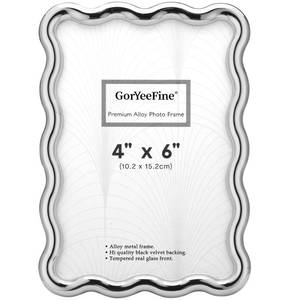 lot 6135 image: GorYeeFine 4x6 Silver Heavy Duty Photo Frame,Wave Design High-End Zinc Alloy Picture Frames 6x4,Fashionable Style frame with Velvet Back for Desktop and Wall Hanging.