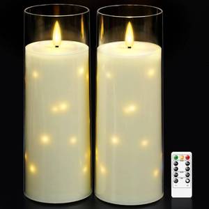 lot 19151 image: kakoya 11 x 4 Large Outdoor Waterproof Flameless LED Candles with Remote and Timer,Acrylic Pillar Candles Battery Operated with Embedded Star String for Porch,Patio,Outdoor Decor,Set of 2(Ivory)(Damage)