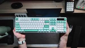 lot 20098 image: Full-Size Mechanical Keyboard with Teal and Cream Keycaps (Missing USB)