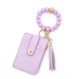 lot 10274 image: Small Coin Purse Zipper Wristlet Purses for Women Cute Silicone Beaded Tassel Credit Card Holder Wallet Minimalist Change Purse With Keychain Compact PU Leather Wallet (Purple)