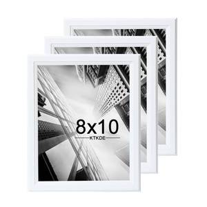 lot 13184 image: KTKDE 8x10 Picture Frame Set of 3,White Wooden frams, Vertical and Horizontal Wall Hanging for Wall or Tapletop Display,Studio Gallery Photo Frame for Photos, Posters and Art Prints