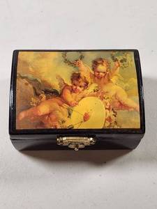 lot 292 image: Decorative Cherub Angel Jewelry Box with Red Velvet Interior