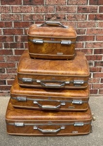 lot 29 image: Vintage American Tourister Hard Shell Travel Suitcase Set and Working Locks & Key. Fabric Interior intact. Largest is 25 inches by 22 inches including wheels and handle.