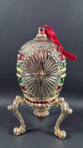 lot 55 image: Wallace Silverplate Decorative Faberge Style Egg with Rotating Nativity Scene and Music