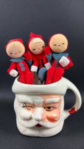 lot 112 image: Vintage Made in Japan Santa Claus Face Ceramic Coffee Mug and Felt Elves Shelf Sitter