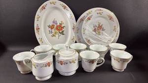 lot 114 image: Dynasty Floral Pattern Fine China (2) Dinner Plates (2) Salad Plates (1) Oval Platter (8) Cups, Creamer and Sugar Bowl.