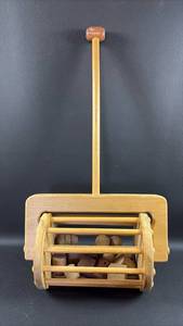lot 123 image: Wooden Tumbler Push Toy with Moving Blocks Toddler Size