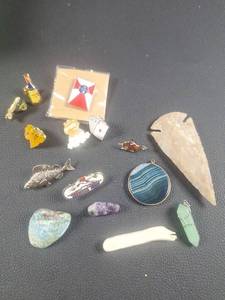 lot 507 image: Mixed Lot of Enamel Pins, Gemstone Pendants, Ivory, and Novelty Collectibles