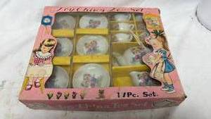 lot 211 image: Childrens Porcelain Tea Set with Boy and Girl Design