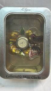 lot 219 image: Elgin Butterfly Flower Collectible Mini Clock