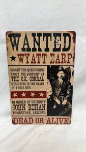 lot 261 image: Wyatt Earp Wanted Poster Metal Sign