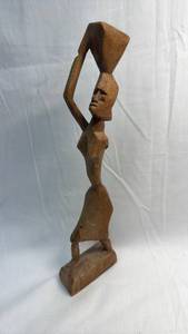 lot 39 image: Hand Carved African Wood Figure Carrying Water Vessel