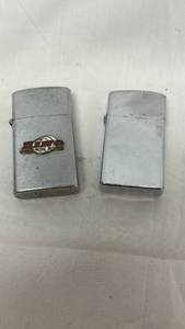 lot 62 image: Zippo ATU World-Wide Movers Chrome Lighter Collection