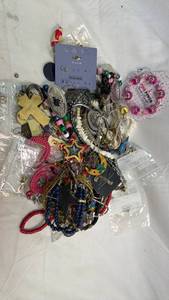 lot 99 image: Mixed Jewelry Lot with Earrings, Keychains, and Beaded Accessories
