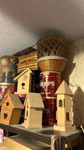 lot 50637 image: Mixed Home Decor Collection with Wooden Birdhouses and Wicker Baskets top shelf