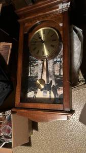 lot 50653 image: Wooden Pendulum Wall Clock with Guitar Design