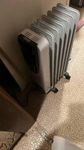 lot 50661 image: DeLonghi Oil-Filled Radiator Space Heater