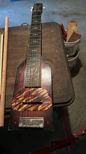 lot 50670 image: Lap Steel Guitar with Tortoiseshell Pickup Guard