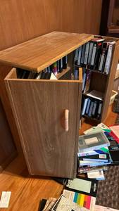 lot 50697 image: Wood Media Storage Cabinet with VHS Collection