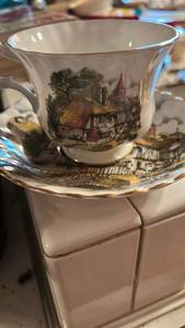 lot 50702 image: English Cottage Scene Tea Cup and Saucer Set
