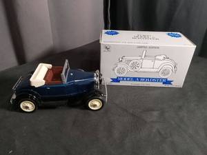 lot 5903 image: Ford Model A Roadster Die Cast Car with Coin Bank