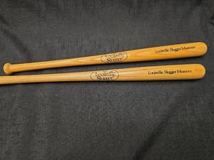 lot 50750 image: Louisville Slugger Museum Commemorative Mini Baseball Bats Set of 2