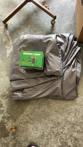 lot 779 image: Electric Pump with Gray inflated mattress