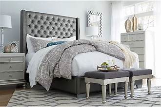 lot 52813 image: Ashley Furniture Coralayne Queen Vinyl Upholstered Bed with Faux Diamond Tufting-Retail- $599.99