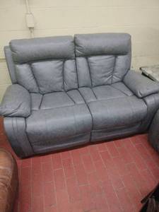 lot 59886 image: Transitional Faux Leather Loveseat in Gray with Dual Manual Recliners