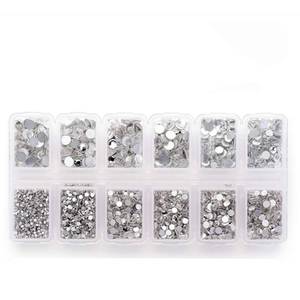 lot 4609 image: 4200 Pack Clear Flat Back Rhinestones for Craft, Round Crystal Gems Stickers for Clothes, 1.5 mm - 4.8 mm, 6 Sizes - Retail $6