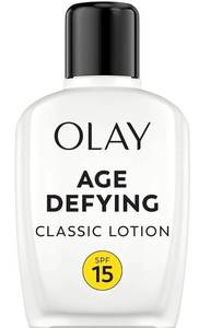 lot 57850 image: Face Moisturizer by Olay, Age Defying Classic Daily Renewal Lotion, With Sunscreen, Classic,4 oz - Retail $12