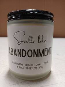 lot 27906 image: Smells Like Abandonment Novelty Scented Candle - Retail $15