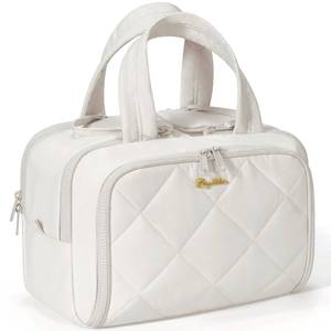 lot 25413 image: Travel Toiletry Bag, Large Wide-open Puffy Toiletry Bag for Women, Lightweight Quilted Makeup Bag Cosmetic Organizer with Handle Water-resistant Travel Essentials for Toiletries Accessories Beige - Retail $24
