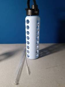 lot 155 image: Glass Water Bottle with Rubber Sleeve  - Retail $0