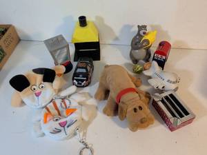 lot 20 image: Mixed Toy and Collectible Lot with Plush Animals and NASCAR Car