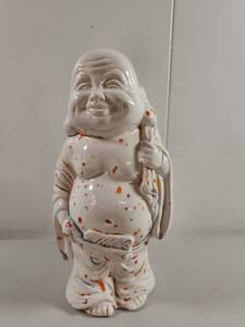 lot 103 image: White Porcelain Laughing Buddha Figurine with Red Orange Speckled Design