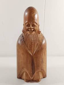 lot 119 image: Hand Carved Wood Figurine with Elongated Head and Beard