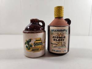 lot 142 image: Old Hillbilly Atomic Blast Miniature Liquor Jug Set with Stoneware Crock