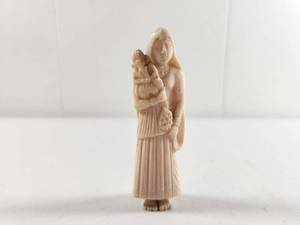 lot 146 image: Carved Celluloid Figurine Woman with Child