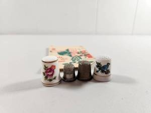 lot 153 image: Collectible Thimble Set with Old Sharps