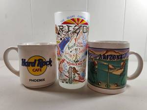 lot 166 image: Arizona Tourism Coffee Mug Set - Hard Rock Cafe Phoenix and Grand Canyon State