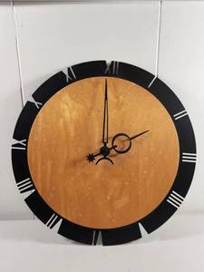 lot 178 image: Umbra Wood and Black Wall Clock with Roman Numerals