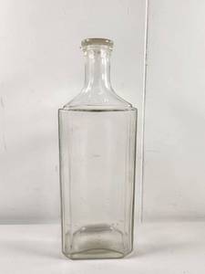 lot 210 image: Vintage Clear Glass Liquor Bottle with Embossed Marking