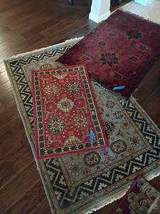 lot 909 image: 3 Area Rugs.  Various Sizes.  See pictures.  Located in Basement with Walkout