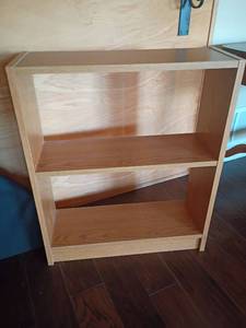 lot 911 image: Bookshelf.  No back.  30 x 25 x 9.  Located in Basement with Walkout