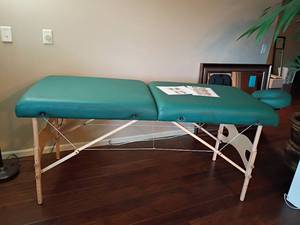 lot 916 image: Portable Massage Table.   Standing 33 x 87 x 30. Folded 33 x 35 x 30