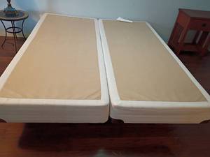 lot 921 image: King Sized Bed Frame with Split Box Springs.   18 x 72 x 83.  Located in Basement with Walkout