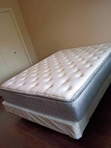 lot 928 image: Queen Size Bed Frame with Mattress and Box Springs.   Located in Basement with Walkout